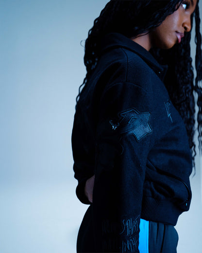 DREAMERS STORM VARSITY